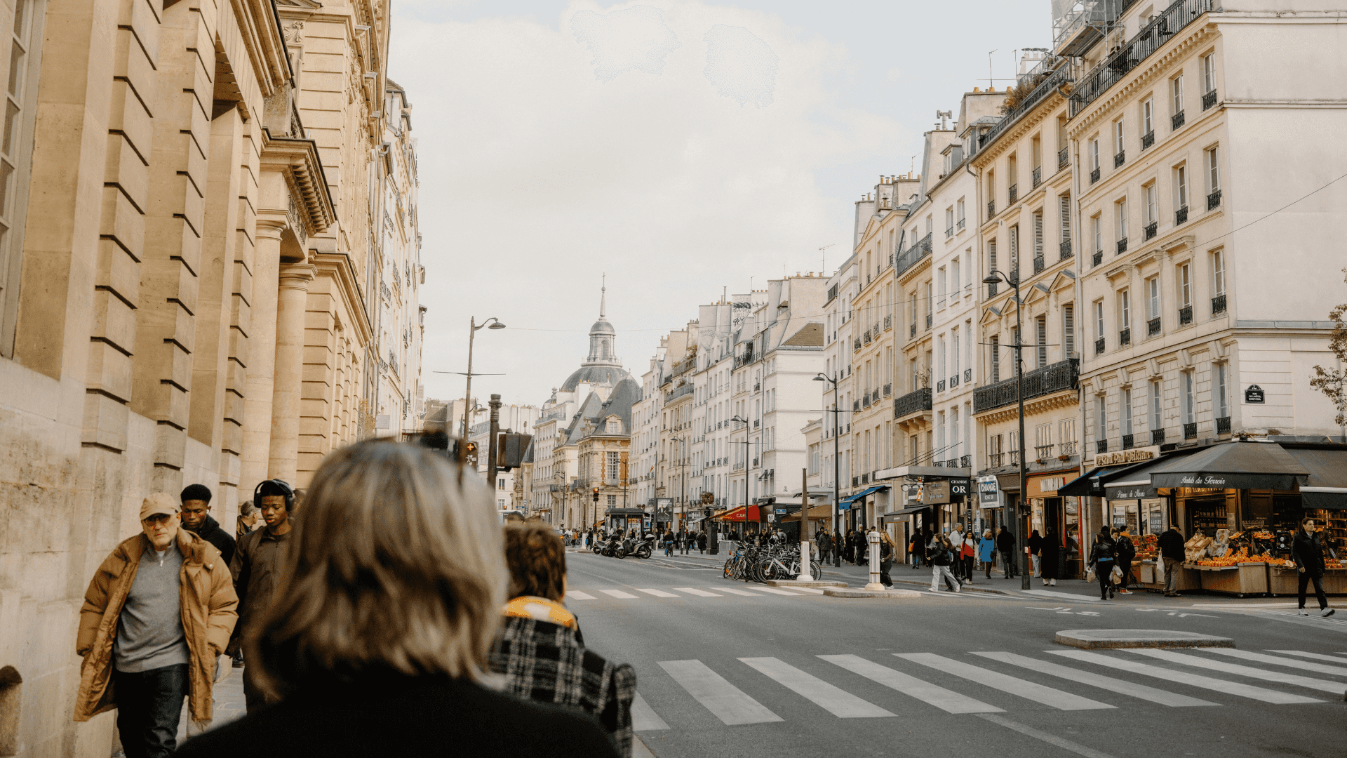 European city street with everyday life bustling around