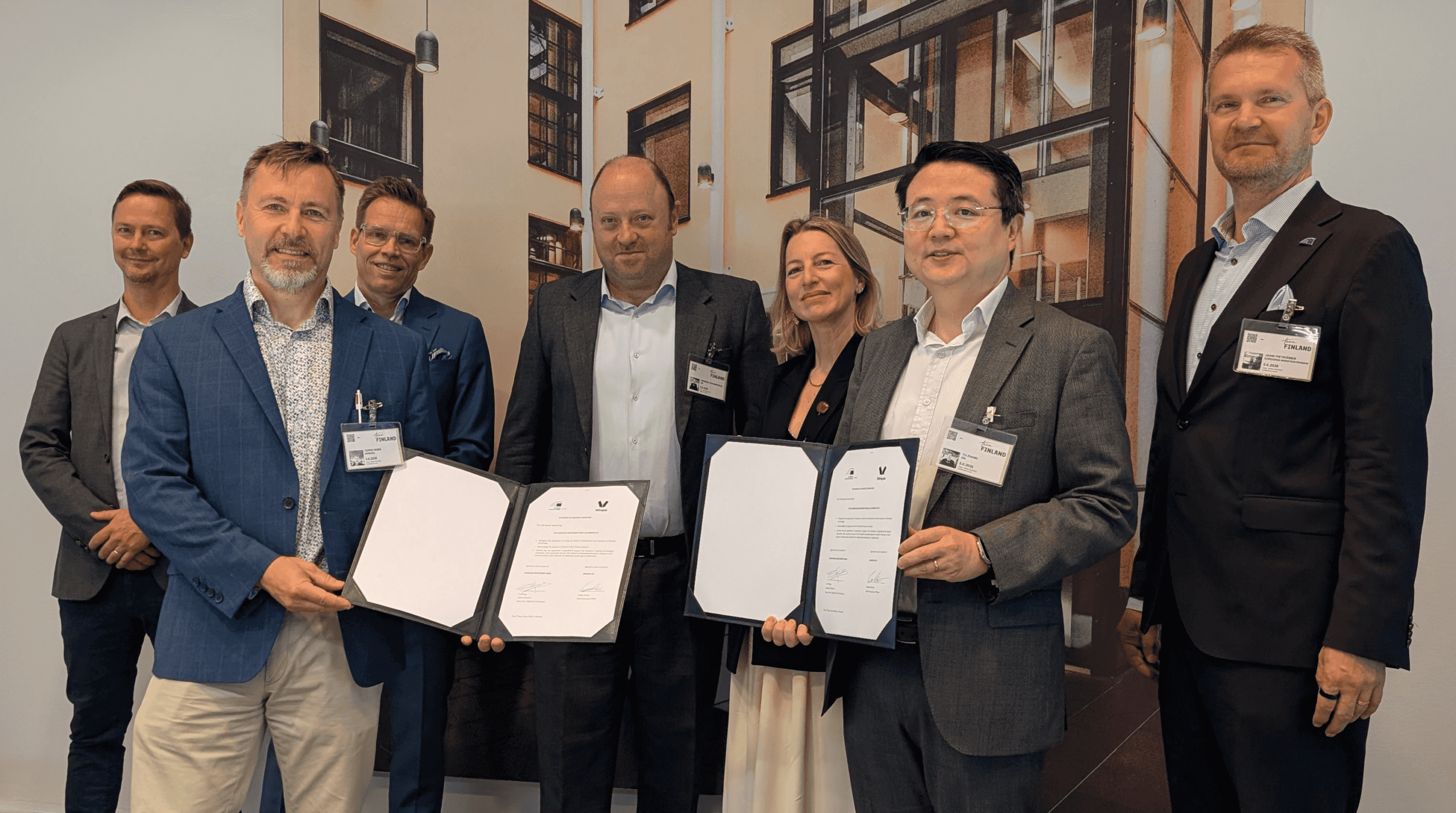 Wirepas CEO and CFO with EIB team in the loan signing event