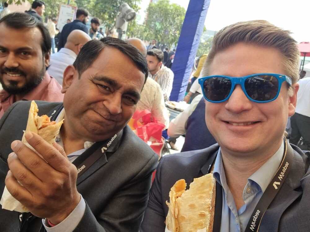 Picture of Wirepas sales guys Jani and Ashish in india eating local wraps