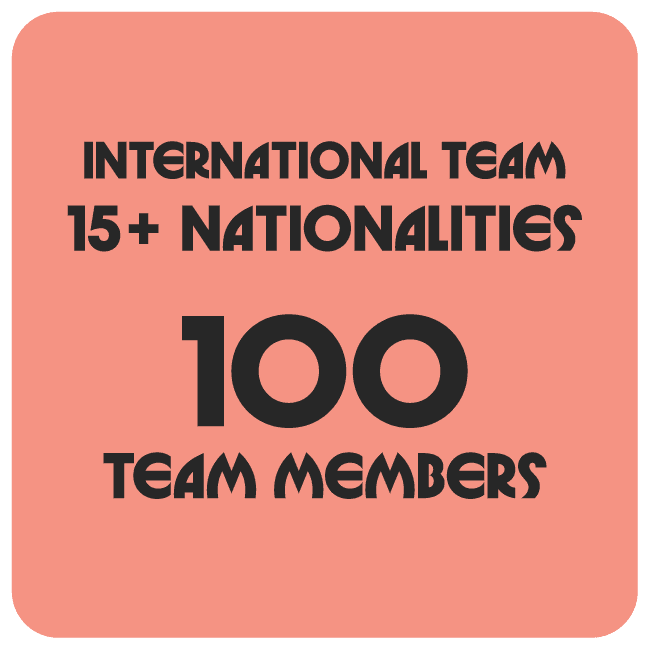 Pink box with black text saying "International team, 15+ nationalities, 100 team members"