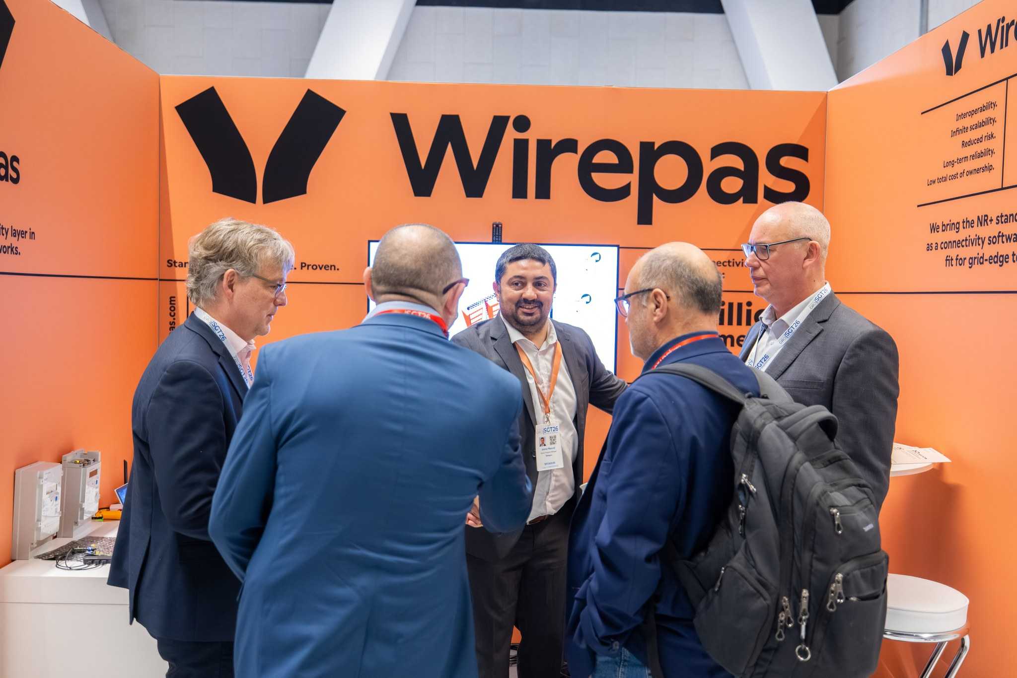 Wirepas employees chatting with event participants at SGT 2026 in Paris